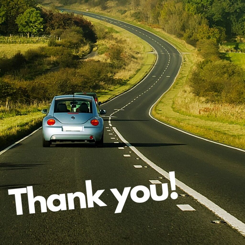 a blue car driving away along a winding road with the words thank you written below