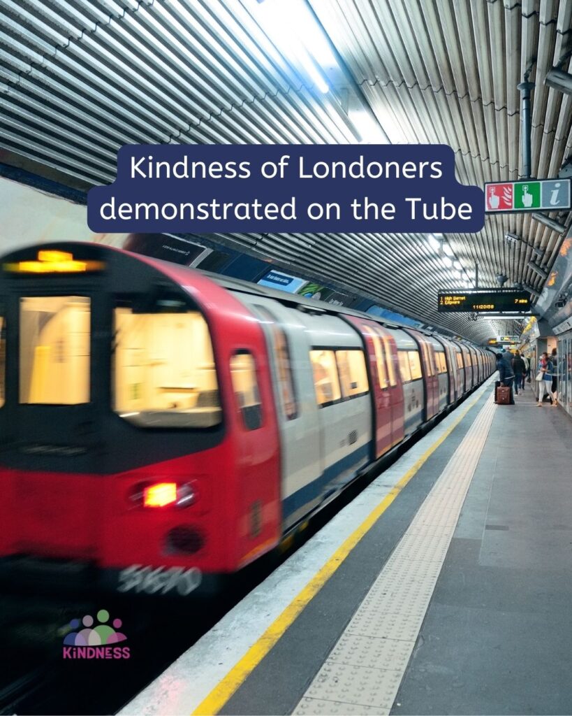 A tube train pulling into a tube station. Text overlaid reads “Kindness of Londoners demonstrated on the Tube."