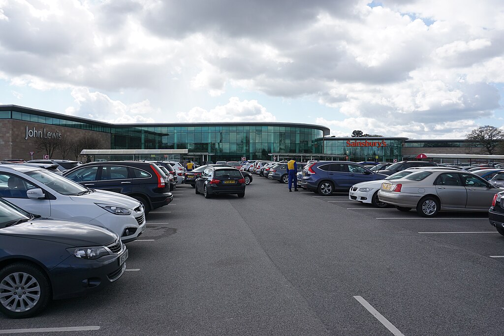 A busy car park outside Sainsbury’s and John Lewis in Cheadle.